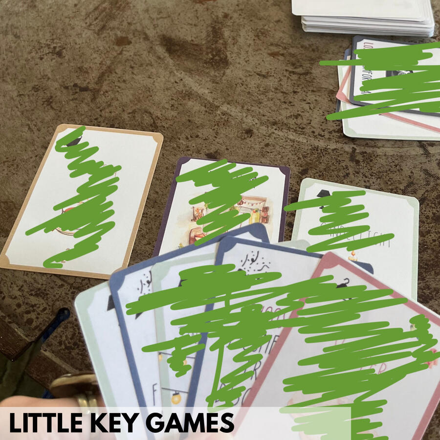 Little Key Games logo / stamp with the words and a skeleton key in it